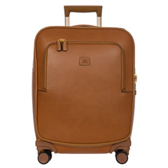 Tan Bric's Cabin Spinner Suitcase with four wheels and sleek design, perfect for travel and easy maneuverability.