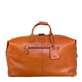 Tan medium holdall by Bric's, featuring a spacious design and durable material, perfect for travel or everyday use.