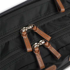 Black Bric's Zipped Pilot Suitcase cabin luggage with sturdy handle and wheels, designed for travel and easy maneuverability.