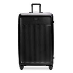Briggs & Riley Sympatico 3.0 black extra large spinner suitcase with four wheels and a spacious interior.