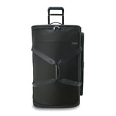 Large black Briggs & Riley Baseline 2 wheel duffle bag with sturdy handles and spacious interior for travel.