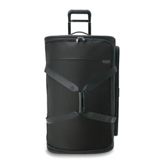Large black Briggs & Riley Baseline 2 wheel duffle bag with sturdy handles and spacious interior for travel.