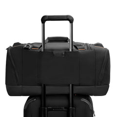 Large black travel duffle bag by Briggs & Riley, featuring durable material and spacious compartments for easy packing.