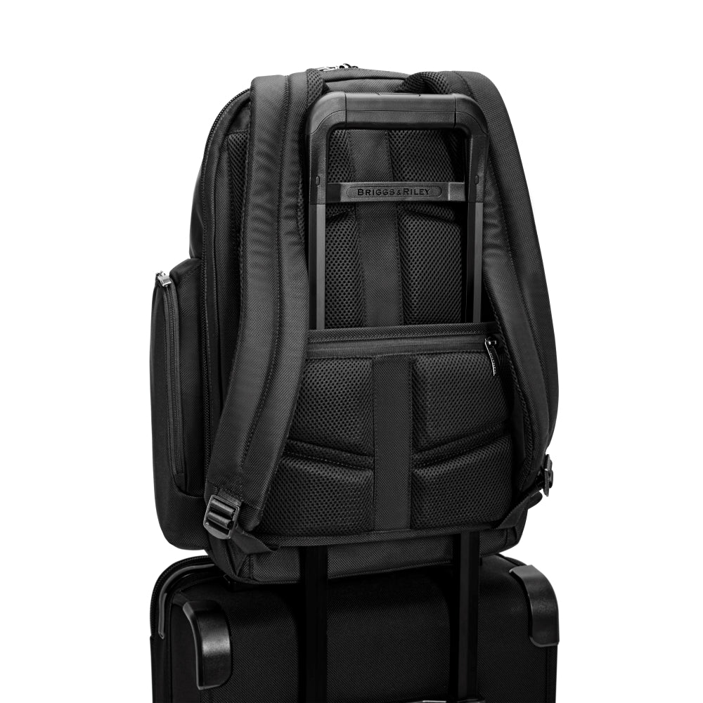 Black medium cargo backpack from Briggs & Riley Luggage, featuring multiple compartments and a sleek design for work.