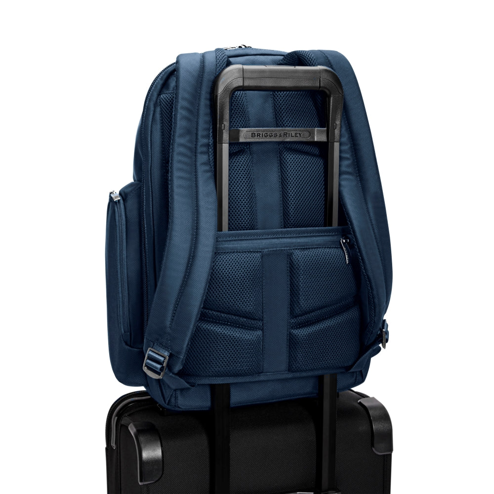 Navy medium cargo backpack by Briggs & Riley, featuring multiple compartments and durable fabric, ideal for work use.