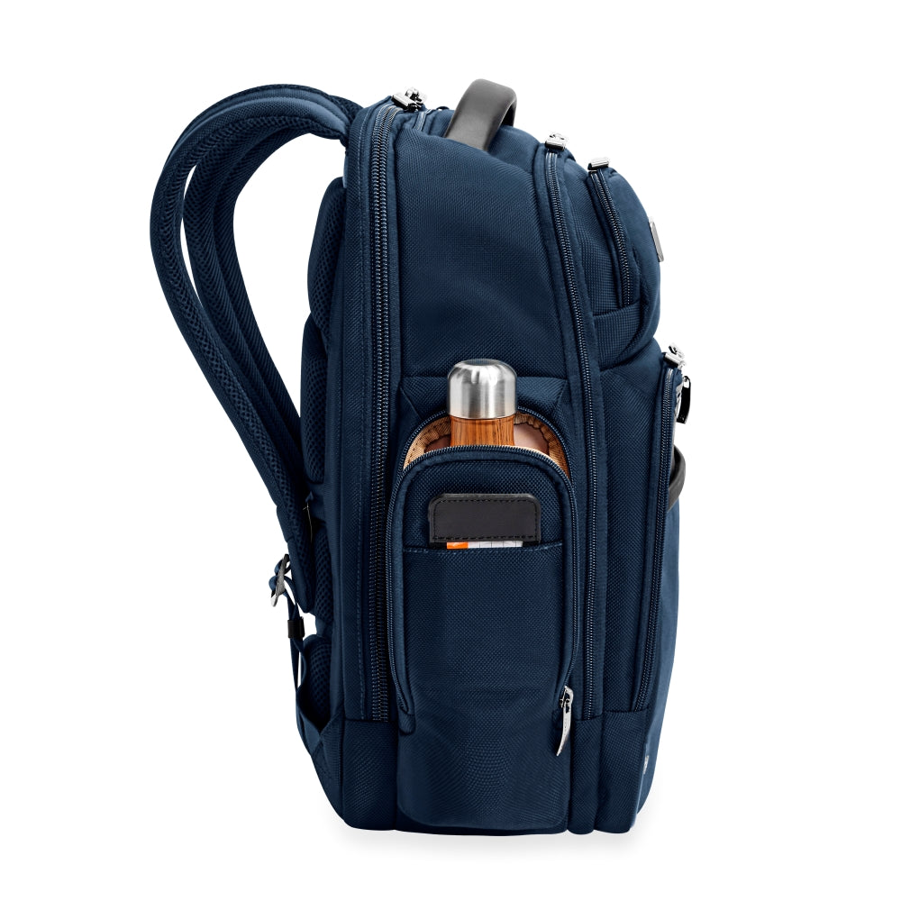 Navy medium cargo backpack by Briggs & Riley, featuring multiple compartments and a durable design for work use.