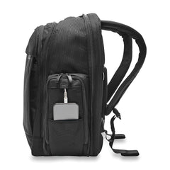 Black Briggs & Riley Baseline 2 travel backpack with multiple compartments and ergonomic design for comfortable carrying.
