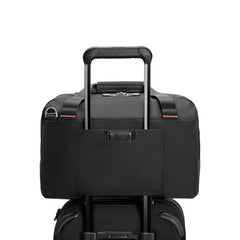 Black Underseat Holdall by Briggs & Riley, featuring a sleek design and spacious interior for travel convenience.