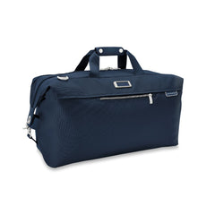 Briggs & Riley Baseline 2 Weekender Duffle in navy, showcasing spacious design and durable fabric for travel.