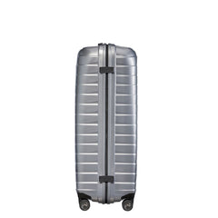 Silver Samsonite Proxis 81cm spinner suitcase with smooth wheels and durable exterior, perfect for check-in luggage.