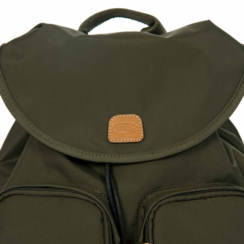 Olive green Bric's X Travel 2 pocket backpack showcasing spacious compartments and adjustable straps.