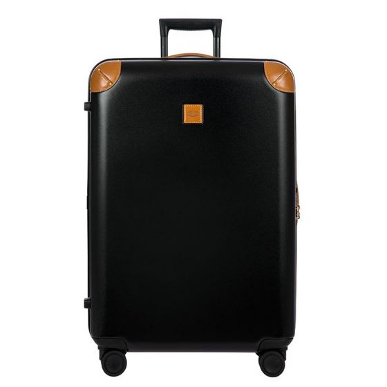 A polycarbonate checked spinner suitcase with leather trim, shown upright from the front.