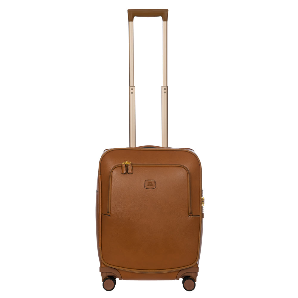 Tan Bric's Cabin Spinner Suitcase with four wheels and secure handle, designed for compact travel and easy maneuverability.