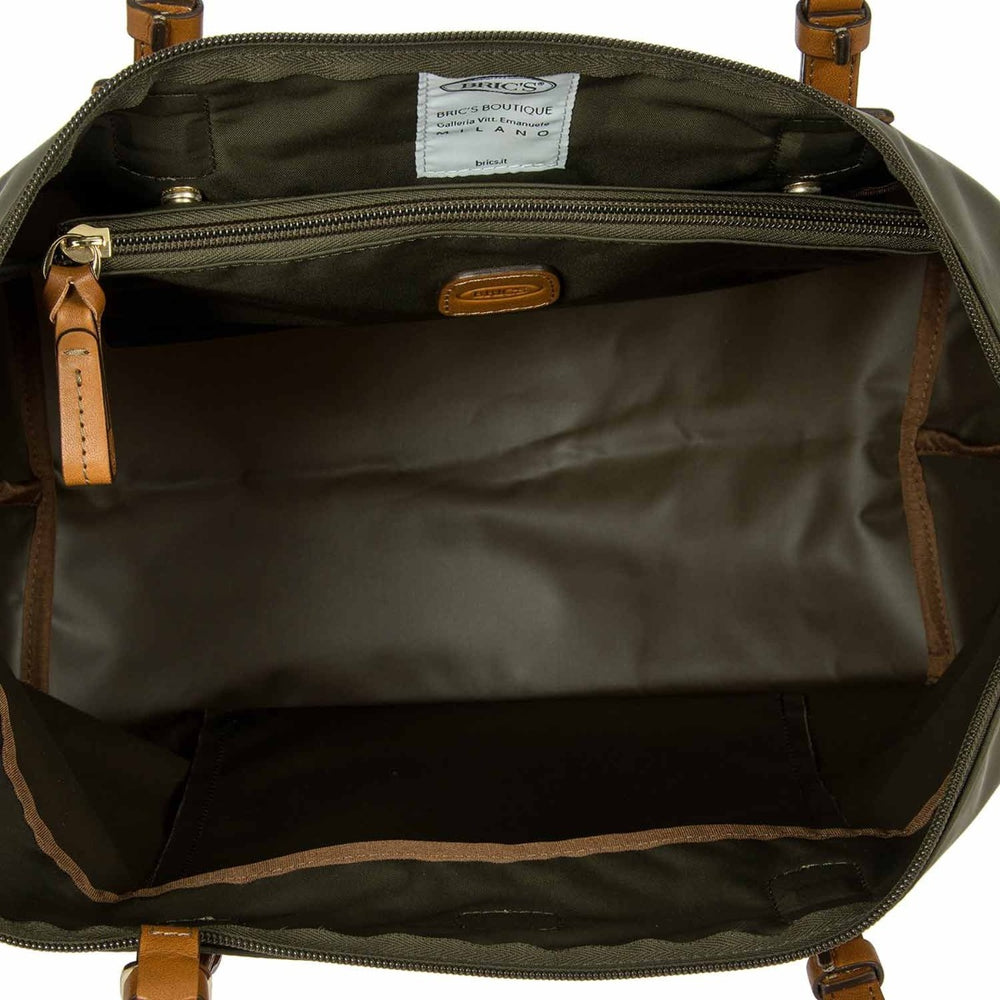Olive green Bric's Large Sportina Bag, a stylish duffle perfect for travel, featuring sturdy handles and spacious interior.