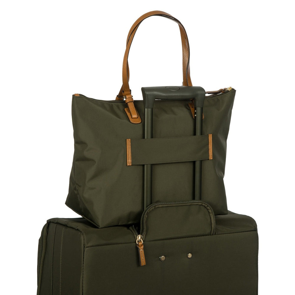 Large olive green Sportina duffle bag by Bric's, showcasing durable material and spacious design for travel or gym use.