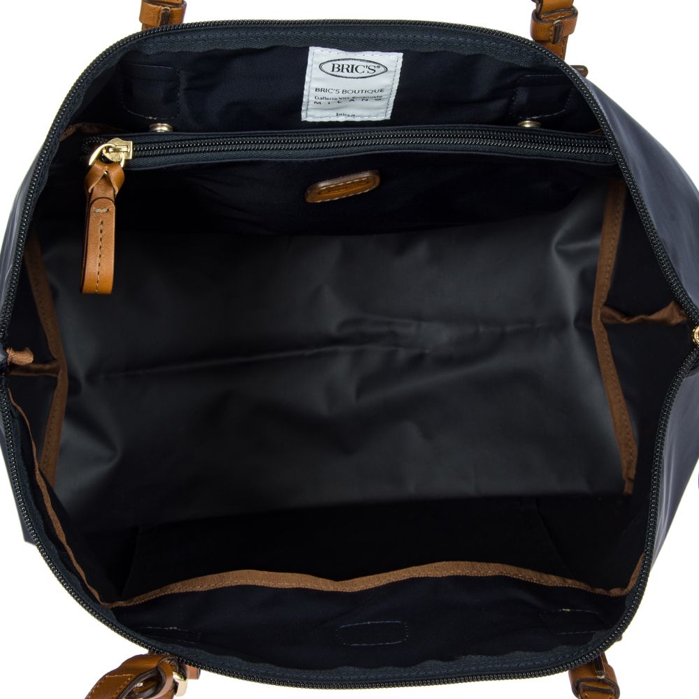 Large Bric's Sportina bag in ocean blue, showcasing a stylish duffle design with ample storage and durable material.