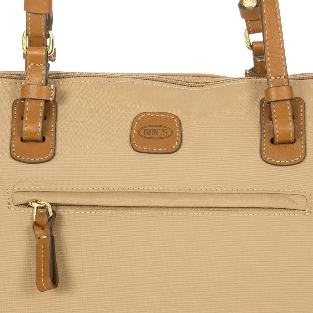 Bric's Large Sportina Duffel Bag in cappuccino color with spacious interior and sturdy handles.