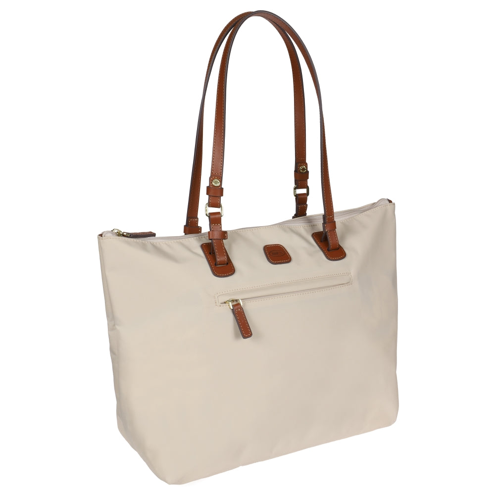 Beige Large Sportina Bag by Bric's, stylish duffle with dual handles and spacious interior for travel or gym use.
