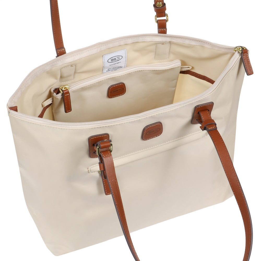 Beige Large Sportina Bag by Bric's, featuring a spacious design ideal for travel and stylish duffle functionality.