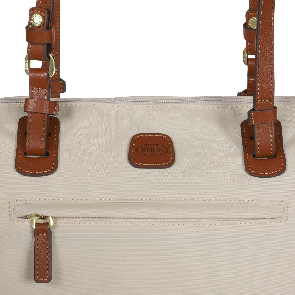 Beige Large Sportina Bag by Bric's, showcasing a stylish design and spacious interior for travel or gym use.