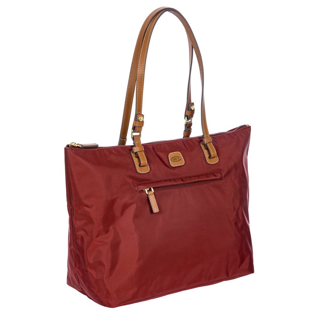 Large bordeaux Sportina duffle bag by Bric's, featuring sturdy handles and a spacious interior for travel or gym use.