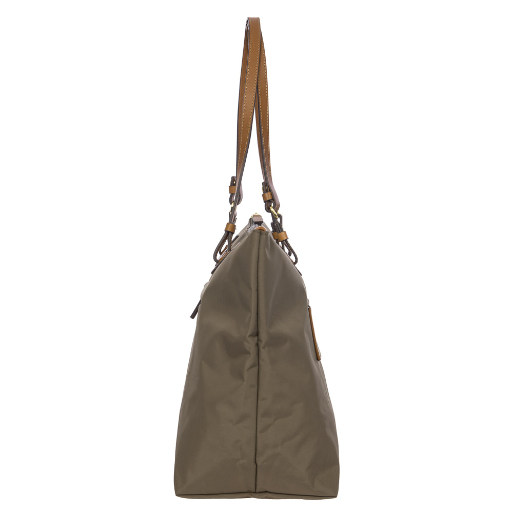 Large Sportina Bag by Bric's in nut color, showcasing a spacious duffle design with sturdy handles and sleek style.