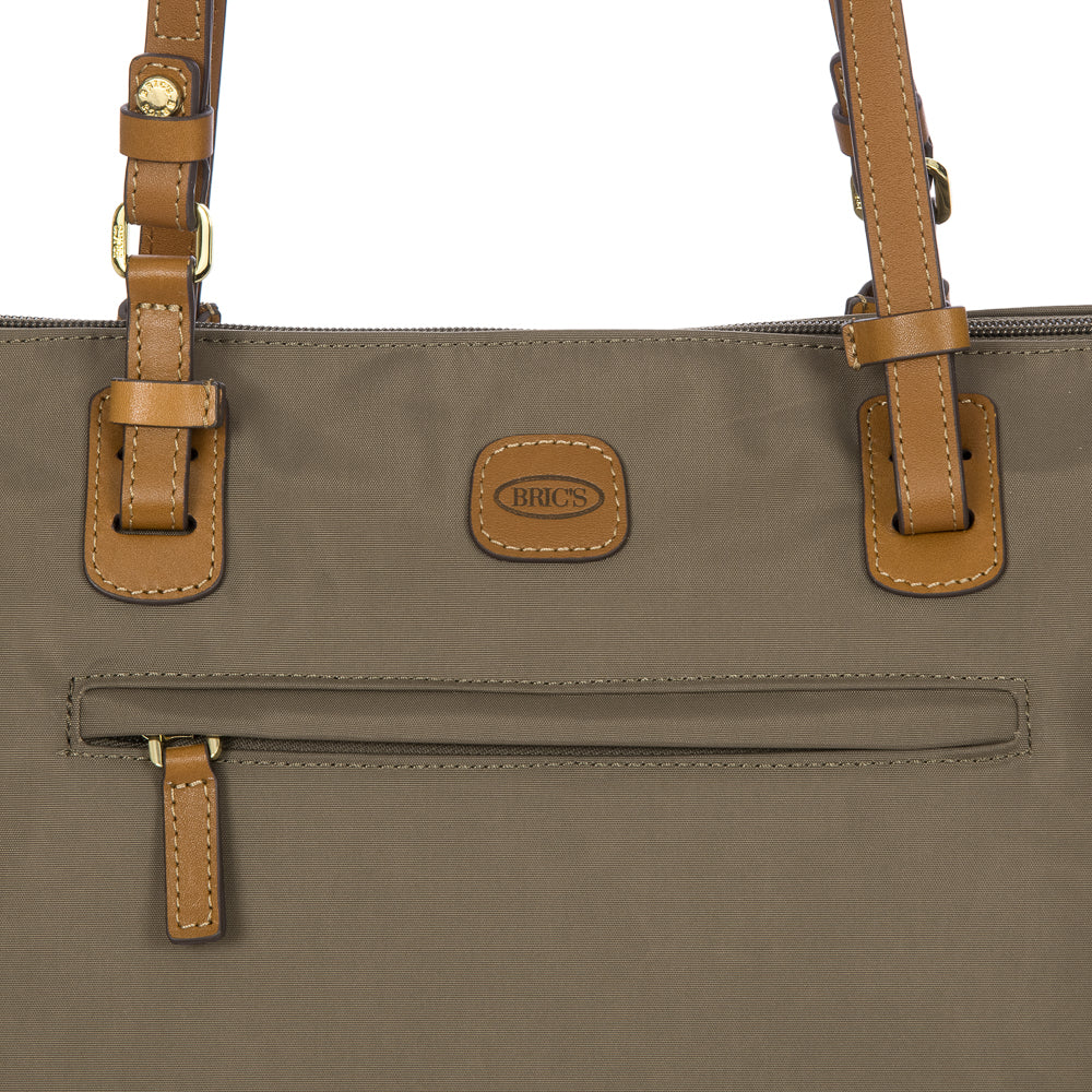 Large Sportina Bag by Bric's in nut brown, showcasing a spacious design and durable materials for travel or gym use.