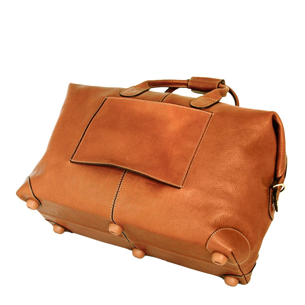 Bric's medium tan holdall featuring durable handles and a spacious interior for travel or gym use.