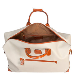 Cream Bric's Small Clipper Duffle from the Firenze collection, featuring a sleek design and sturdy handles.
