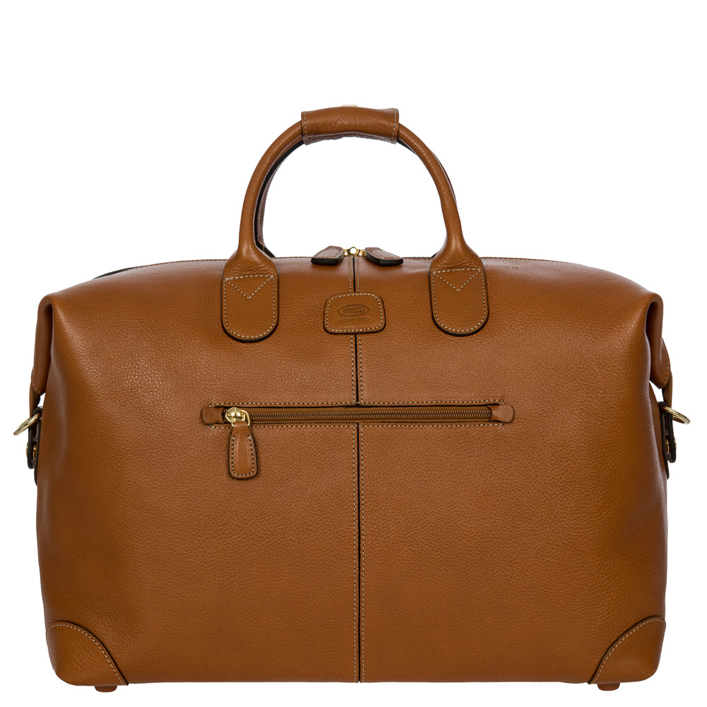 Tan small holdall by Bric's, made of durable leather, featuring sturdy handles and a spacious main compartment for travel essentials.