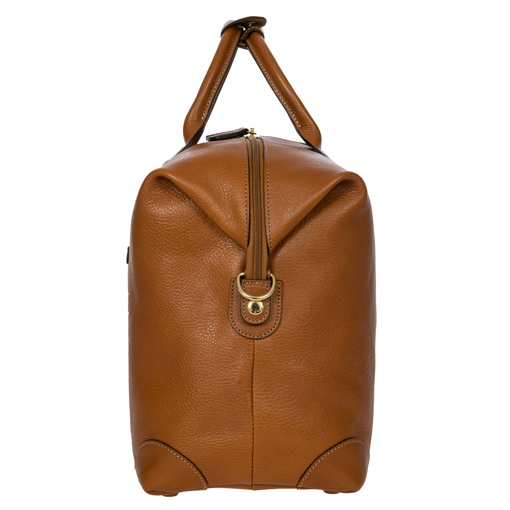 Tan small holdall by Bric's, compact duffle bag with leather accents, suitable for travel and weekend trips.