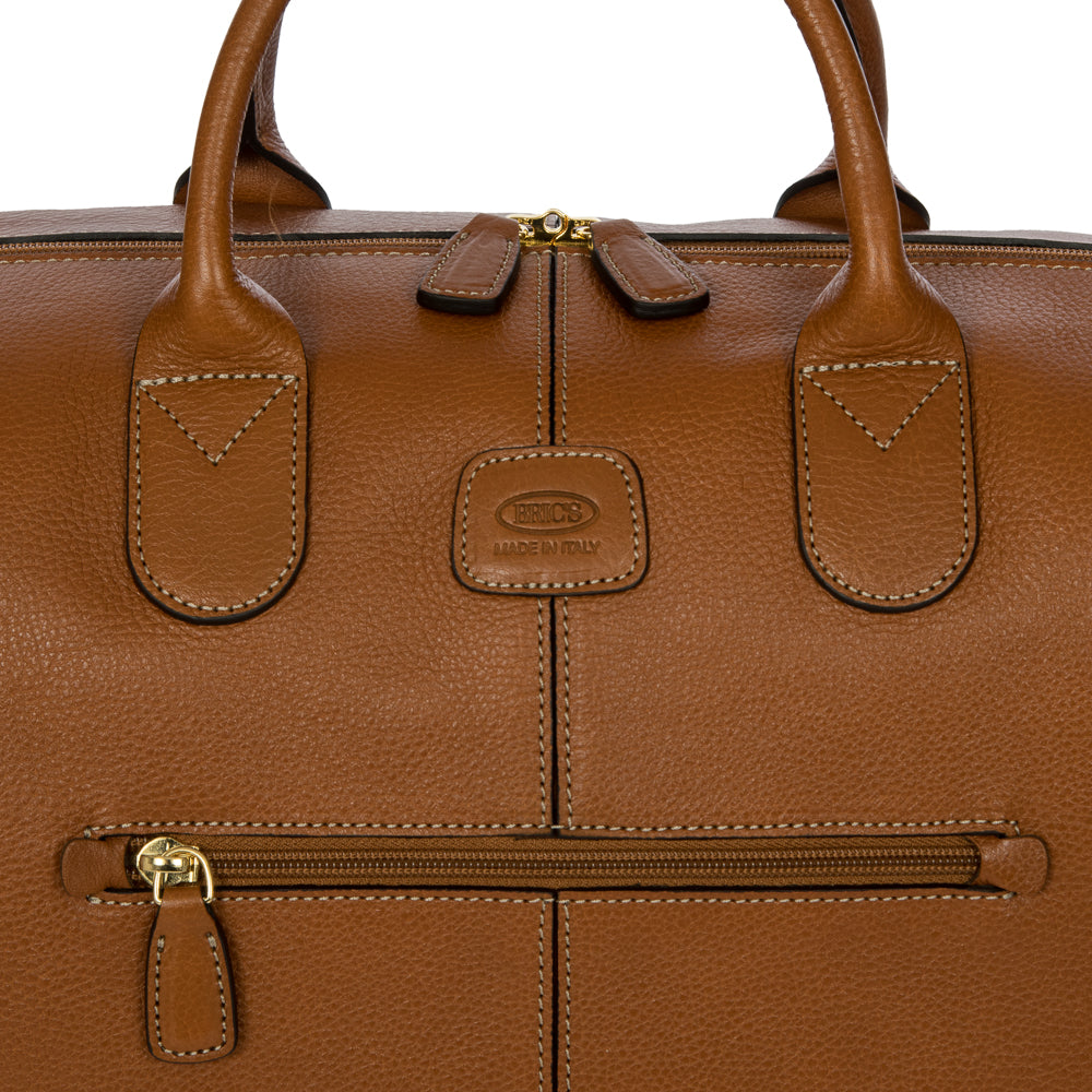 Tan Bric's small holdall duffle bag made of durable Pelle material, featuring a compact design with leather accents.