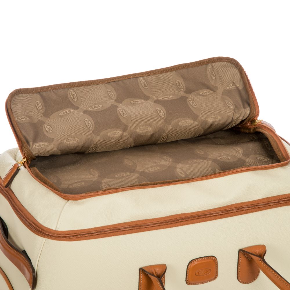 Cream Bric's small wheeled holdall from the Duffles & Holdalls collection, with sturdy wheels and compact design.