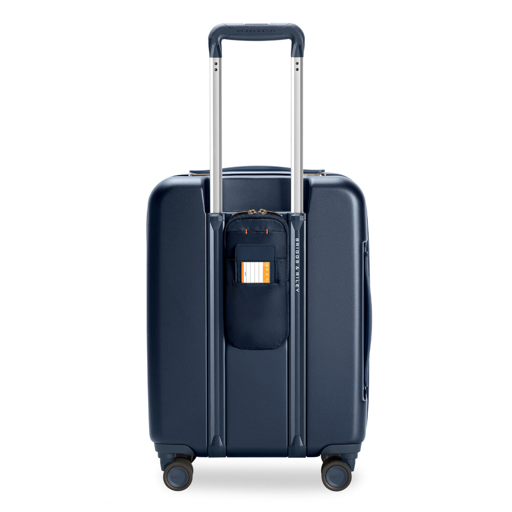 Briggs & Riley Sympatico 3.0 53cm expandable carry-on spinner suitcase in navy, featuring smooth wheels and sturdy handle.