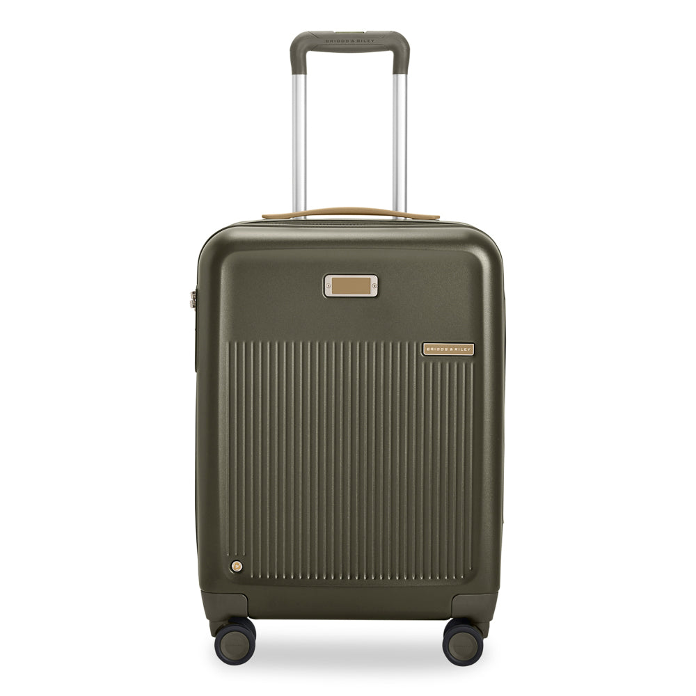 Olive green Briggs & Riley Sympatico 3.0 expandable carry-on spinner suitcase with four wheels and ergonomic handle.