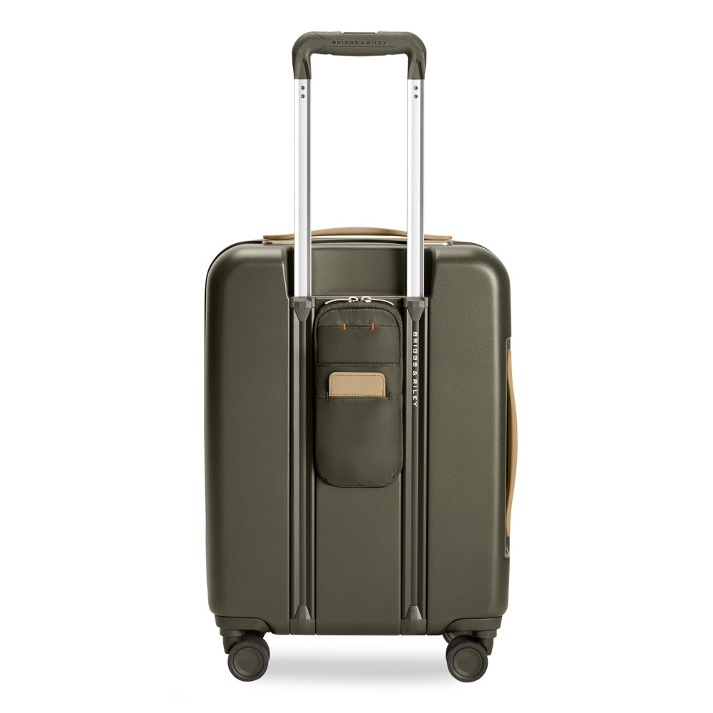 Olive green 53cm expandable carry-on spinner suitcase by Briggs & Riley, featuring smooth wheels and sturdy handles.