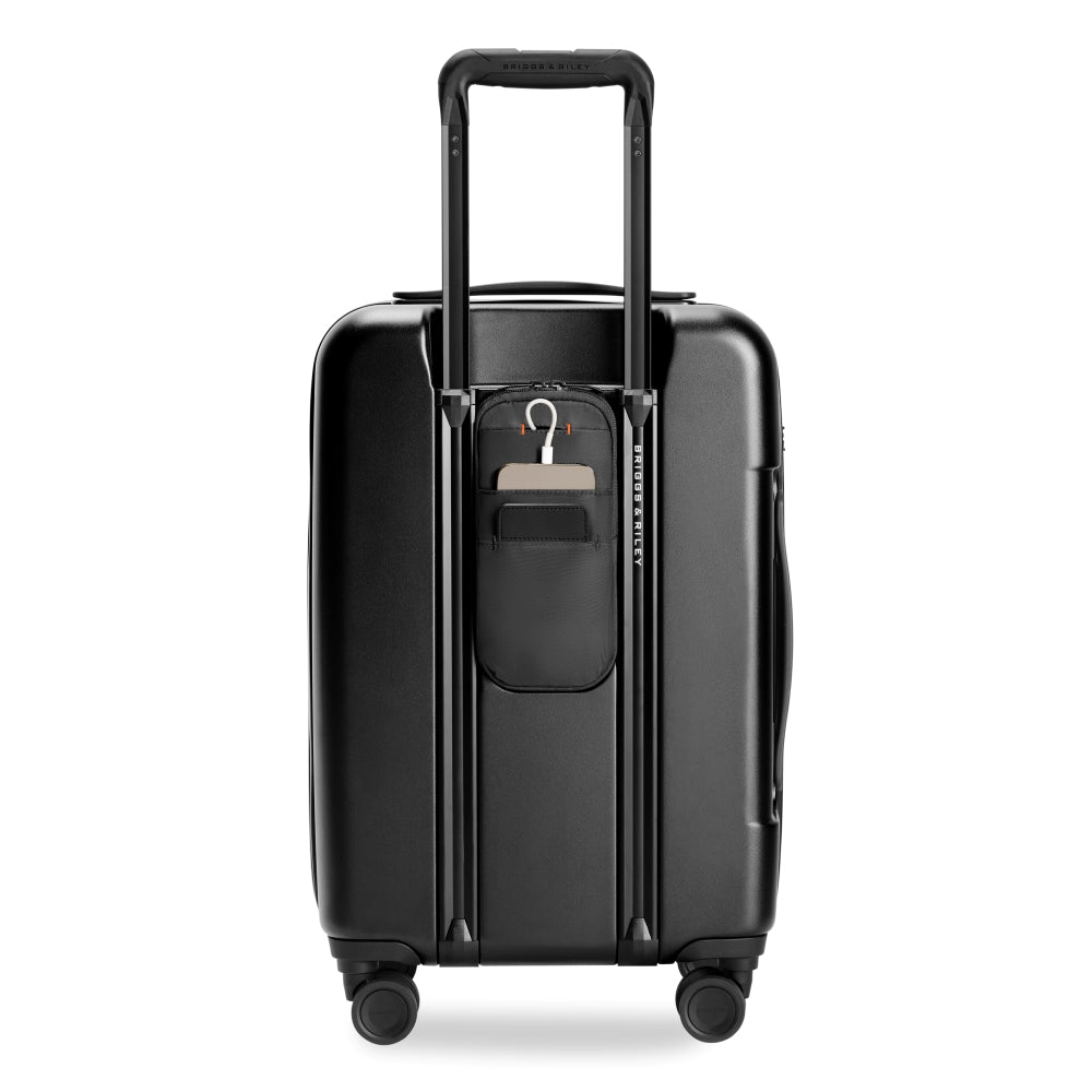 Briggs & Riley Sympatico 3.0 black 56cm front pocket carry-on spinner suitcase on a white background.