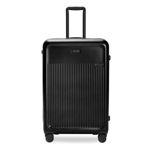 Briggs & Riley Sympatico 3.0 black 76cm expandable spinner suitcase with smooth wheels and sturdy handle.