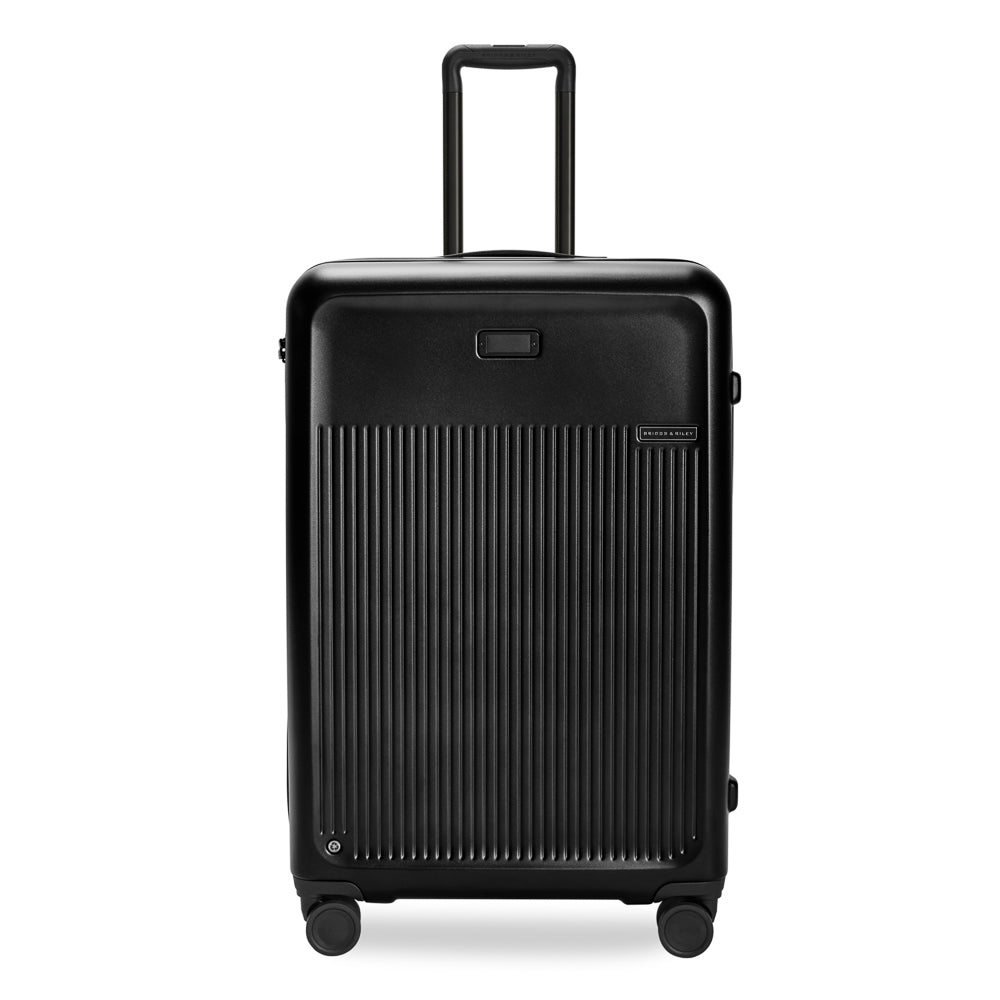 Briggs & Riley Sympatico 3.0 black 76cm expandable spinner suitcase with smooth wheels and sturdy handle.