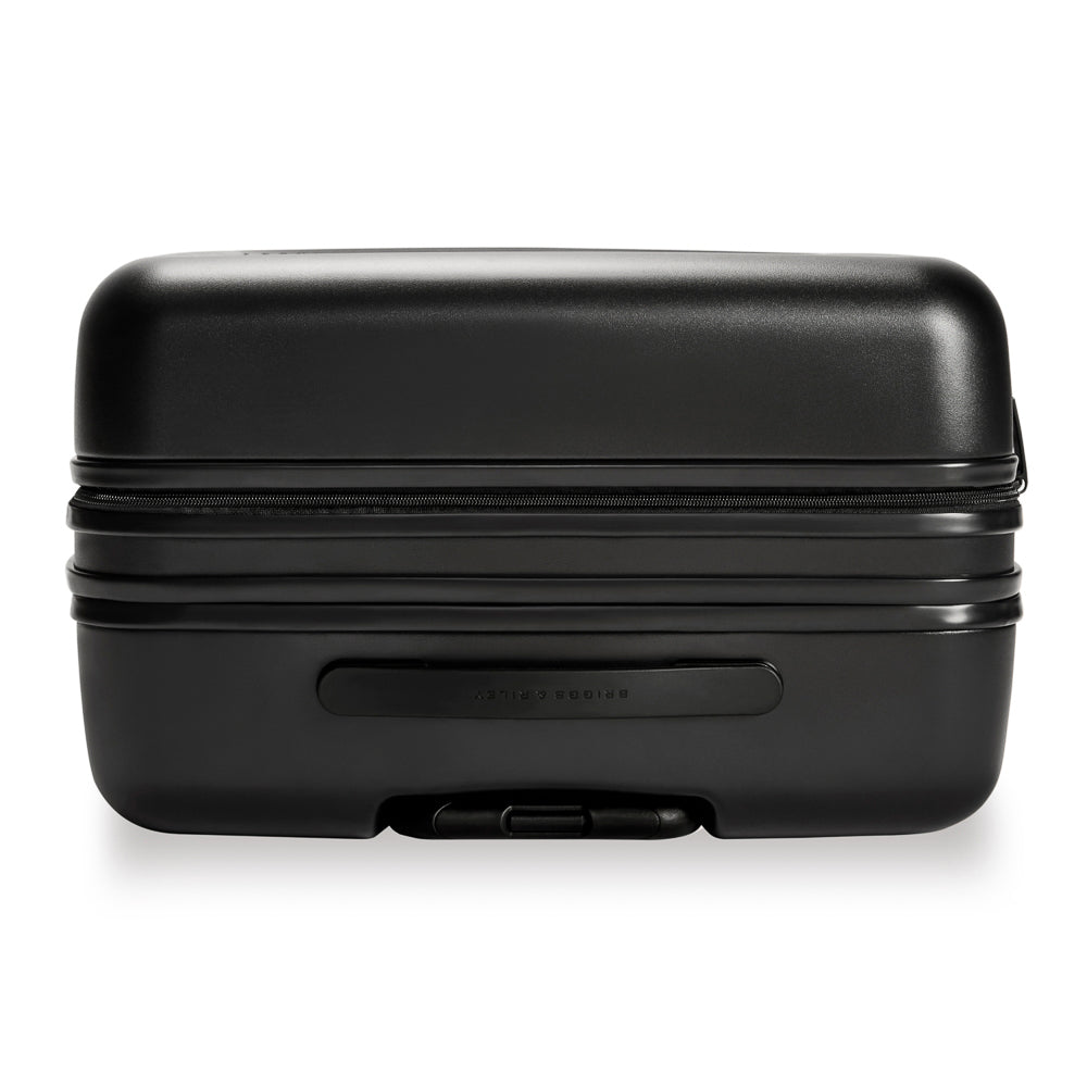 Large expandable black spinner suitcase by Briggs & Riley, featuring a sleek design and durable construction for travel.