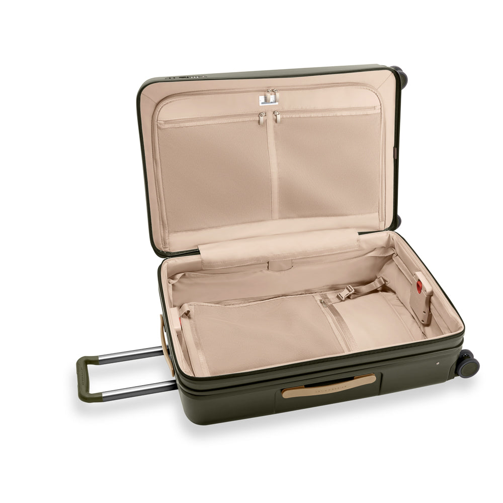 Olive Briggs & Riley Sympatico 3.0 76cm large expandable spinner suitcase with smooth wheels and sturdy handle.