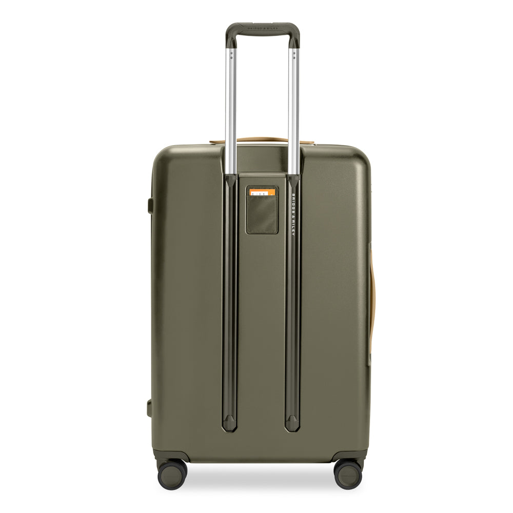 Olive green Briggs & Riley Sympatico 3.0 large expandable spinner suitcase on display.
