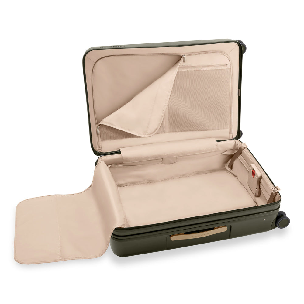 Olive Briggs & Riley Sympatico 3.0 76cm large expandable spinner suitcase with smooth wheels and sturdy handle.