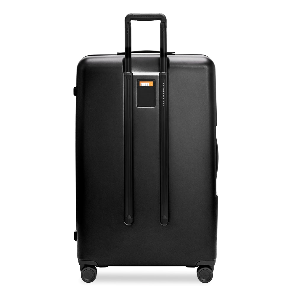 Briggs & Riley Sympatico 3.0 extra large 86cm black spinner suitcase with durable wheels and spacious interior.