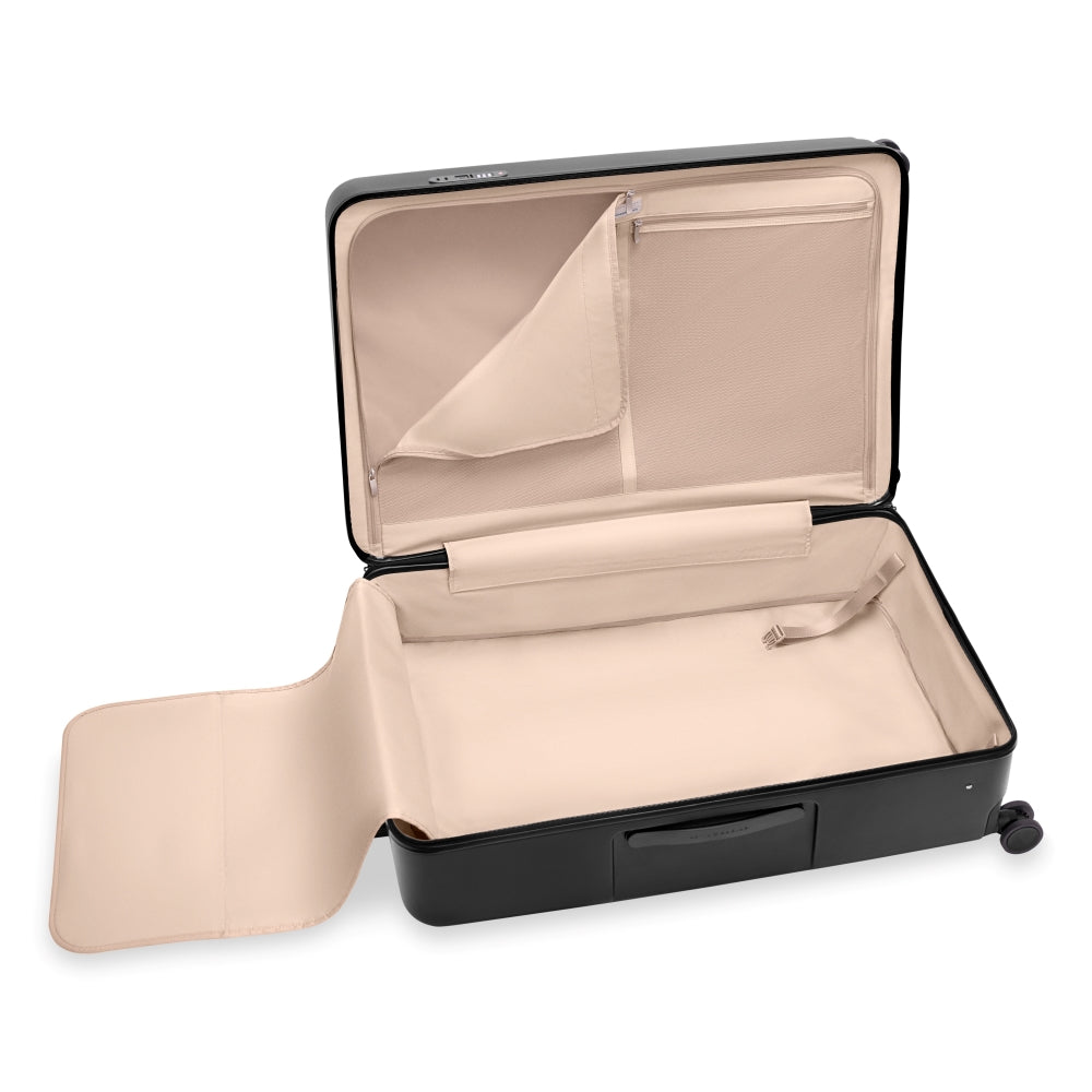 Extra large 86cm black spinner suitcase from Briggs & Riley Sympatico 3.0 with smooth wheels and sturdy handle.