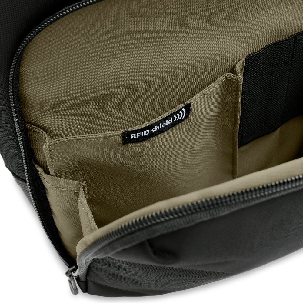 Briggs & Riley HTA Collection black crossbody bag, featuring a sleek design and adjustable strap for day use.