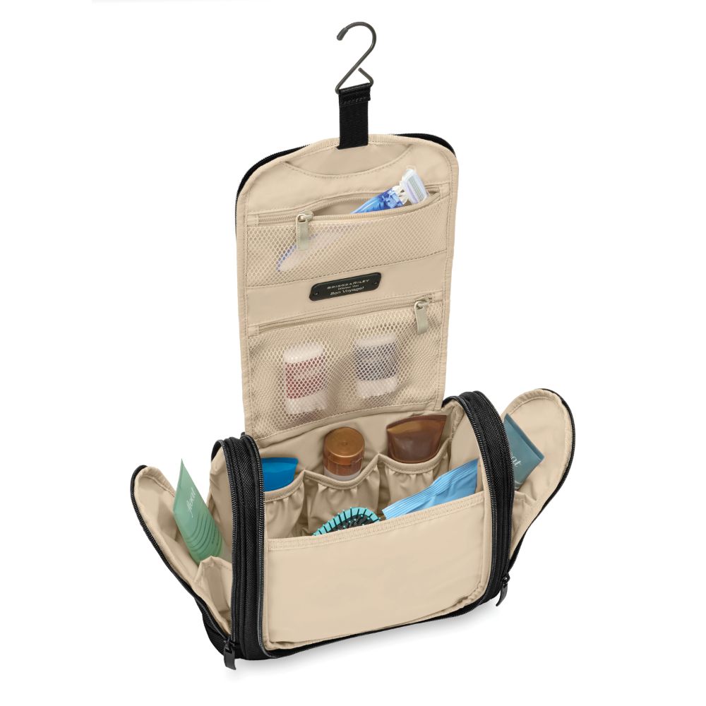 Briggs & Riley Deluxe Hangable Kit in black, showcasing a spacious washbag with multiple compartments and hanging hooks.