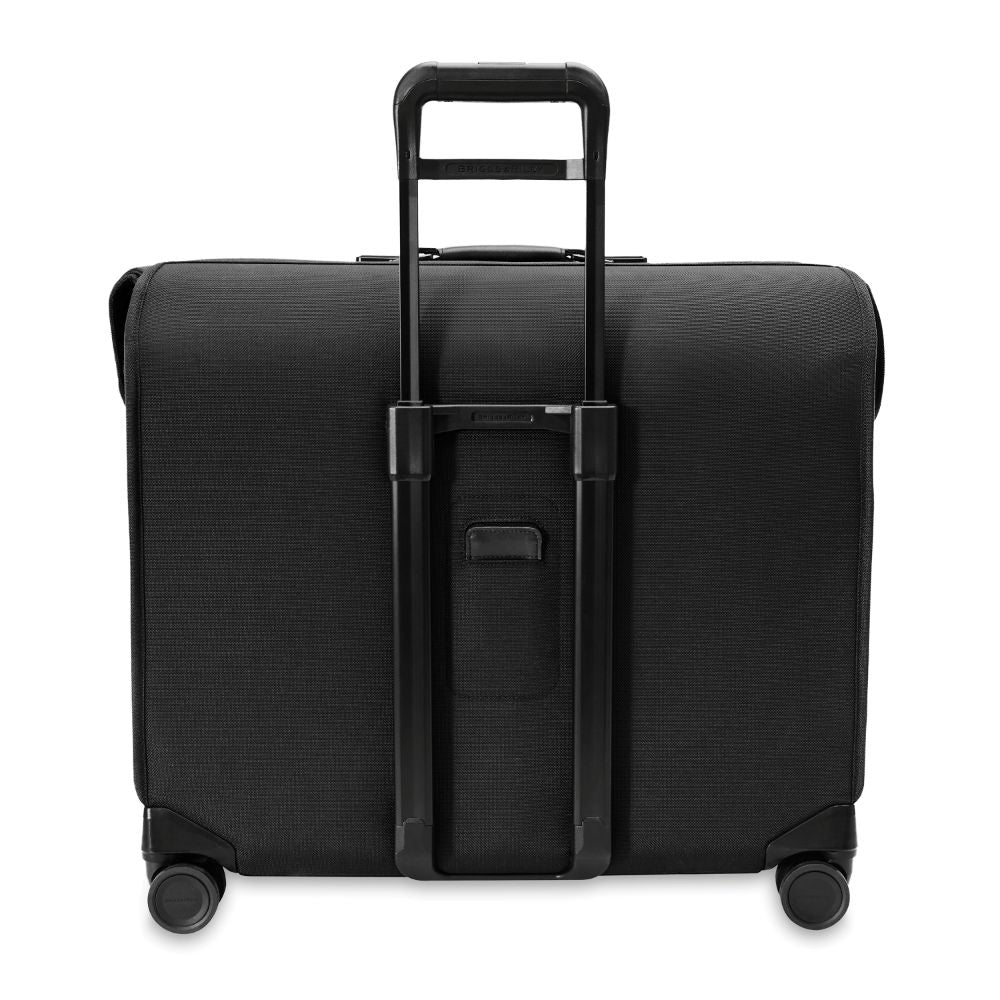 Briggs & Riley Baseline 2 Deluxe Wardrobe Spinner Suitcase in black, showcasing its garment bag design and spacious interior.