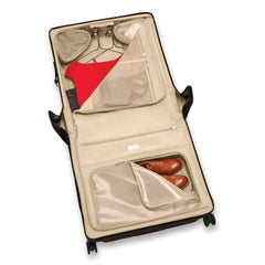 Briggs & Riley Baseline 2 Deluxe Wardrobe Spinner Suitcase in black, featuring garment bag functionality and smooth wheels.