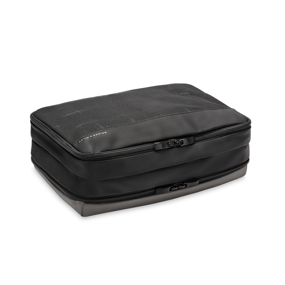 Briggs & Riley double sided packing travel cube in black, showcasing organized compartments for efficient packing.